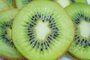 beautiful kiwi fruit slices background photo