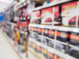 Supermarket Aisle and Shelves in blur for background photo