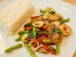 Rice with stir-fried seafood and basil photo