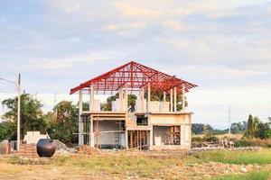 construction residential new house in progress at building site photo