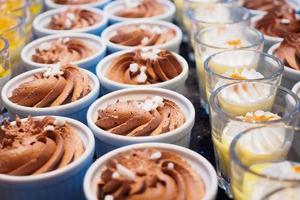 Chocolate mousse in white cup photo