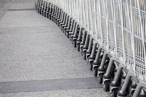 Shopping carts on parking lot photo