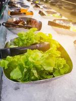 salad bar buffet with fruit and vegetables photo