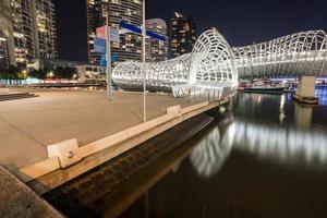 Melbourne, AUSTRALIA - June 15 2015 - Webb bridge at south wharf the iconic modern design with Aboriginal tales of Melbourne, Australia. photo