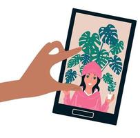 mano con teléfono. hablar con una persona a través de una videollamada. vector. vector