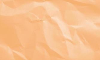 pumpkin pie colored crumpled paper texture background for design, decorative. photo