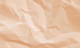 red brown colored crumpled paper texture background for design, decorative. photo