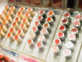 sets of makeup in cosmetics shop photo