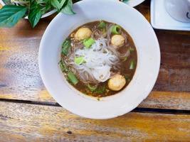 thai style meat ball noodle soup photo