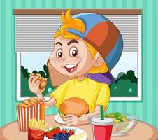 un niño desayunando en la mesa vector