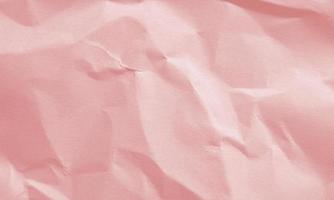 regal red colored crumpled paper texture background for design, decorative. photo