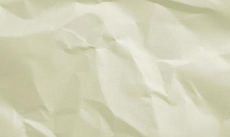 olive colored crumpled paper texture background for design, decorative. photo