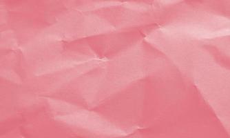 real red colored crumpled paper texture background for design, decorative. photo
