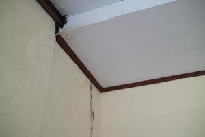 the top corner of a white roof photo