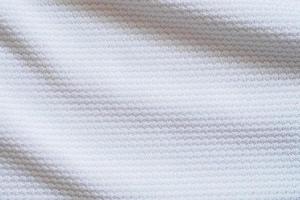 White football jersey clothing fabric texture sports wear background photo