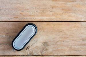 Car Key on old wood table background photo