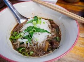 thai style beef noodles soup photo