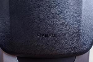 Airbag sign on car steering wheel photo