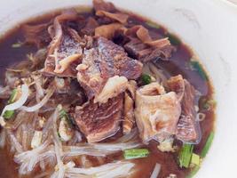 Thai Noodles soup with beef photo