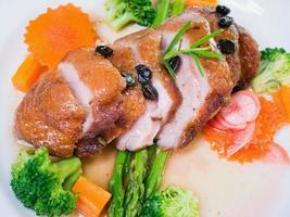 roasted duck with coffee seeds photo