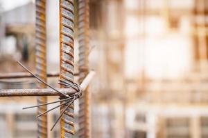 House building construction site with rebar steel to reinforced concrete photo