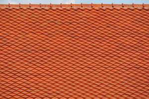 Roof tile on top sky background photo