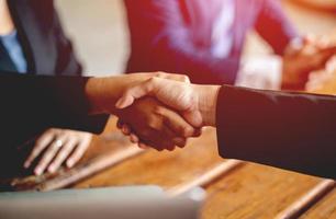 successful business people shaking hands Show cooperation at the end of the meeting business communication business partners Success in business and leadership communication concept photo