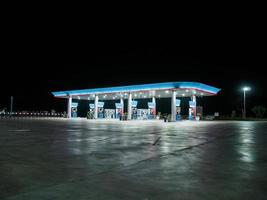 Gas station at night photo