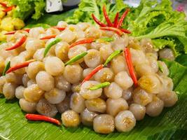 Tapioca dumpling sago balls pork or Saku Sai Moo on banana leaf photo