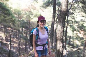 hiking in the forest on a sunny day. photo