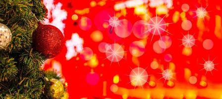 Christmas Tree In Bokeh and blur Background. Ornament And Abstract Defocused Lights. Concept Christmas Day, happy, highlights, holiday, light, merry, new year, night, season 2023. Copy space on right. photo