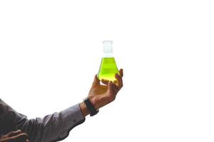 scientist hand holding chemical liquid in scientific glassware in laboratory isolated on white background. photo