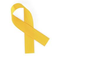 Orange ribbon, symbol of social awareness, isolated on white background, top view. World Cancer Day. copy space. photo