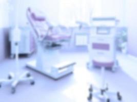 Modern gynecological chair with a modern colposcope in the clinic. Inside view. Soft blurred background. photo