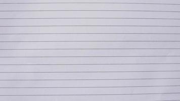 white sheet of paper. Lined notebook paper for background photo