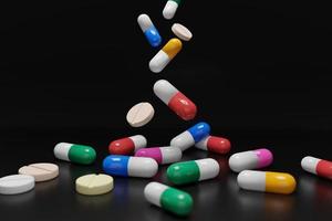 Abstract color capsule on black background. A group of medicine pills. 3D render illustration. photo