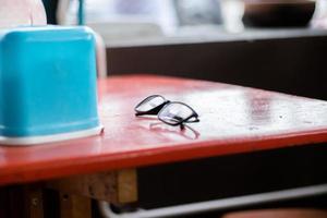 Glasses on the table in a coffee shop, vintage photo