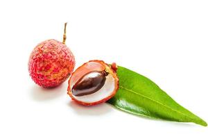 Fresh lychee fruits Litchi with leaves isolated on white background photo