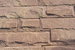 Brick block walls with retro motifs are built to serve as wall walls - and to prevent thieves from stealing - the home and private property of the host. photo