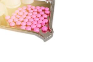 Whole pile of Pink medicine on a holder for  manufacturing concept photo
