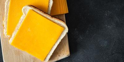 mimolette sándwich queso cheddar desayuno comida fresca comida bocadillo en la mesa espacio de copia foto