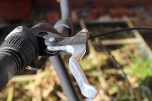 Selective focus show at the handbrake lever on a bicycle. photo
