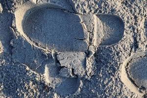 Detailed close up view on sand on a beach at the baltic sea photo