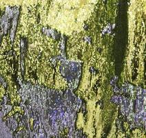 Detailed close up view on samples of cloth and fabrics in different colors found at a fabrics market photo