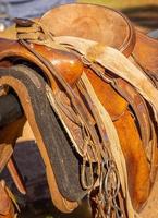 leather crafted horse saddle for a cowboy photo