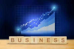 business on word letters cube, Candle stick graph chart of stock market photo