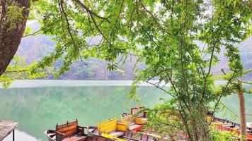 Boat hangered at Sat Tal - seven lakes - is an interconnected group of seven freshwater lakes situated in the Lower Himalayan Range near Bhimtal. photo