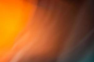 Abstraction of orange light in the dark. Smooth gradient. Horizontal banner photo