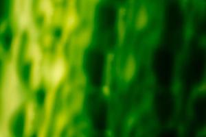 Acid abstract background in green tones. photo
