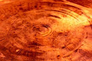 Circles on orange brown fluid photo